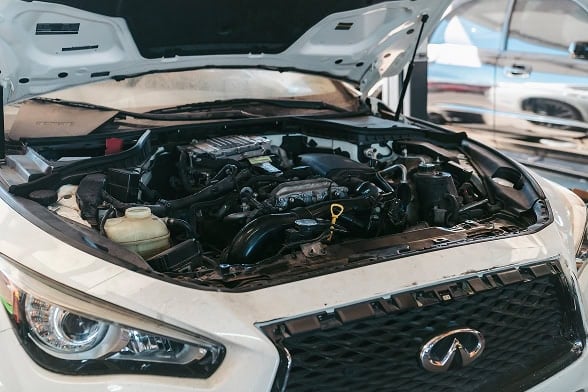 High-performance car engine under the hood at Black Market Racing.