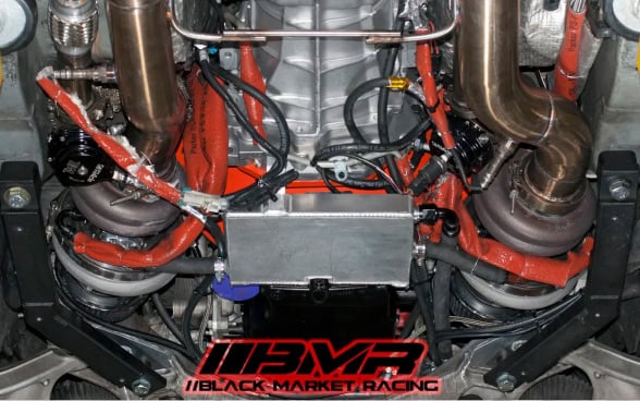 High-performance racing engine with custom parts at Black Market Racing.