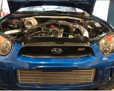 High-performance car engine under the hood of a Black Market Racing vehicle.